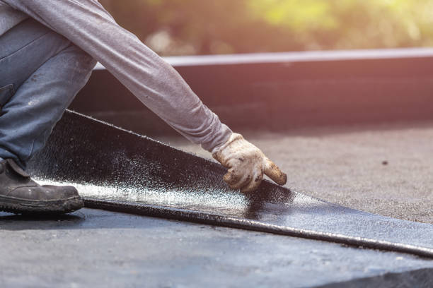 Professional Basement Waterproofing technician working in Hillsboro, OH